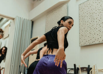 Adults in a dance studio learning choreography, showing how to start dancing as an adult