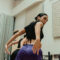 Adults in a dance studio learning choreography, showing how to start dancing as an adult