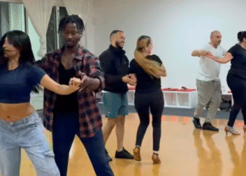 Adults dancing in a studio during an open level class in Sunrise on Mondays and Wednesdays at 8 PM